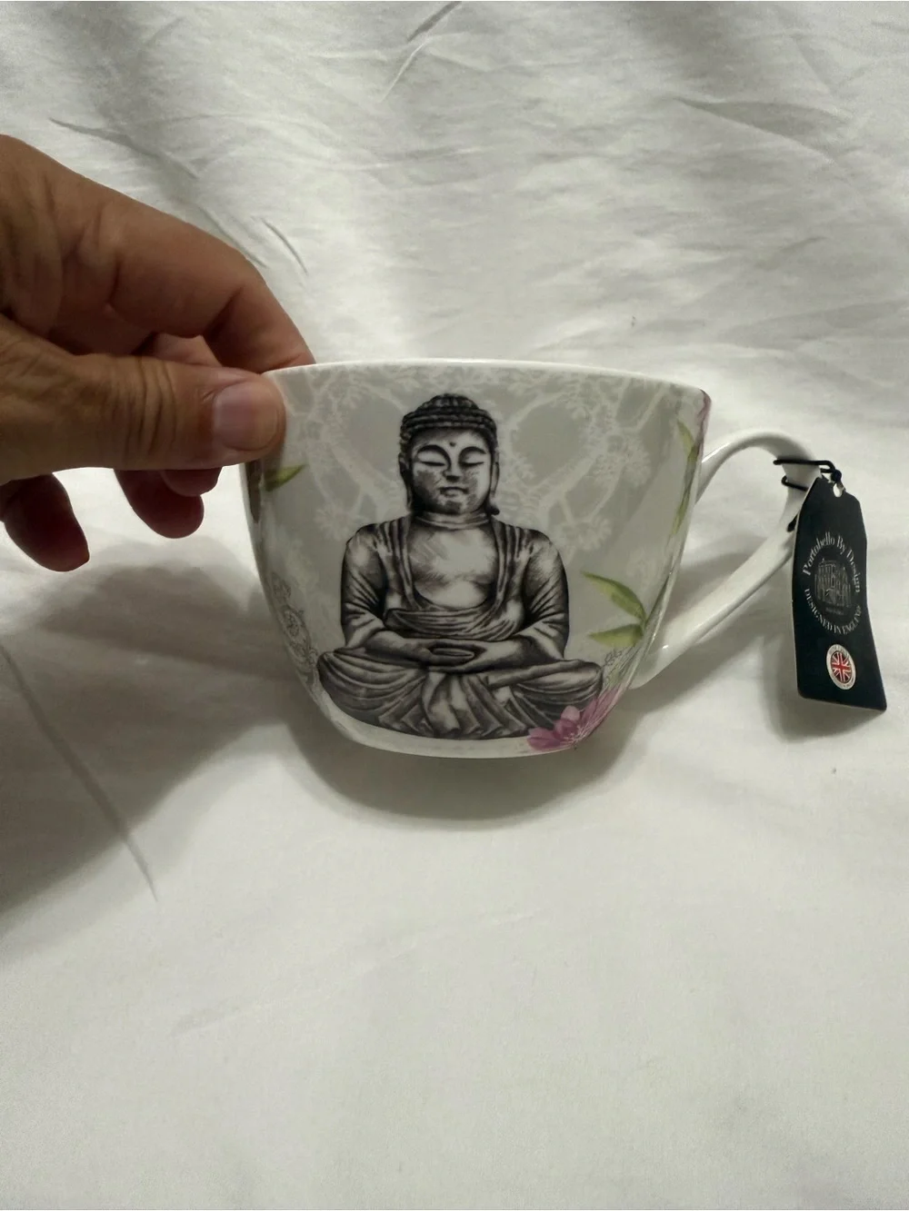 Buddha Stoneware Tea Cup - White and Black with Floral Accents
